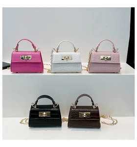 Mini handbags in five colors featuring faux crocodile texture and gold chain straps