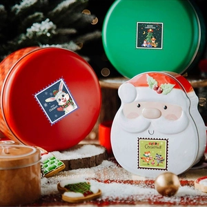 Set di scatole natalizie in latta con stampe di francobolli e illustrazioni di animali