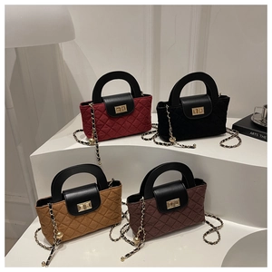 Quilted crossbody bags collection with metal chain straps in burgundy, black, and yellow