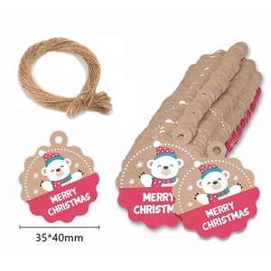 Detail showing polar bear kraft paper Christmas tags with Merry Christmas greeting