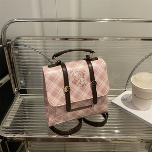 Pink and white checkered shoulder bag with cute cartoon dog pattern and metal logo tag