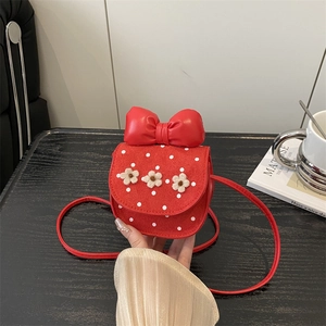 Mini sac bandoulière rouge chic avec pois blancs et nœud floral pour petites filles