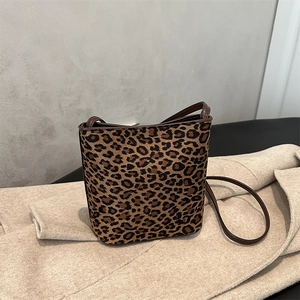 Chic leopard print faux suede bucket bag with slim leather straps for autumn fashion
