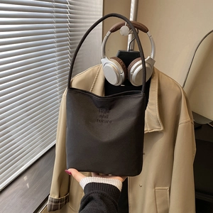 Minimalist black canvas tote bag with Hope and Future embroidery for daily commute
