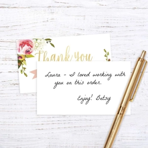 Floral Thank You cards set with gold pen on light wood background for business use