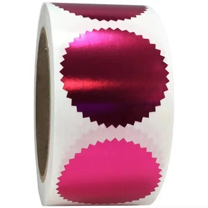 Detailed macro view of deep pink metallic gear-shaped stickers with mirror finish on roll