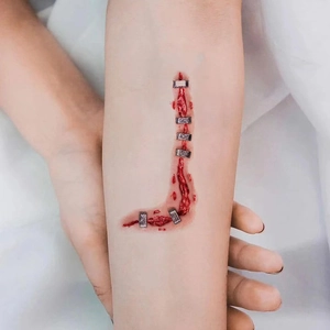 Realistic Halloween 3D scar tattoo sticker with bloody stitches and metal staples on forearm