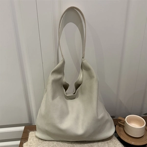 Minimalist cream beige large hobo tote bag in suede finish for daily commute