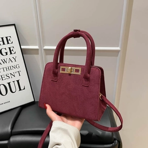 Vintage matte suede burgundy handbag with golden lock and detachable shoulder strap