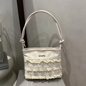 Elegant cream-colored shoulder bag with three-layer lace ruffles and gingham patterns