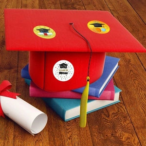 Graduation party stickers with cap and diploma icons on a red graduation hat