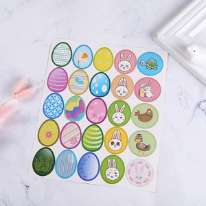 Close-up of Easter stickers sheet with cartoon rabbits and colorful egg patterns