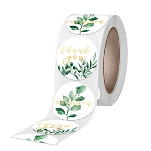Rollo de pegatinas de agradecimiento con ramas verdes y letras doradas para regalos