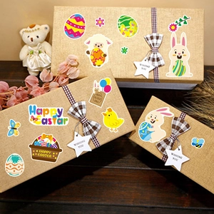 Autocollants Joyeuses Pâques colorés avec lapins et œufs sur coffrets cadeaux