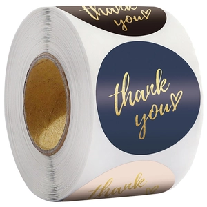 Roll of round gold foil Thank You stickers in navy, brown and pink for gift packaging