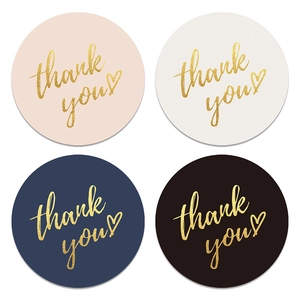 Round gold foil thank you stickers in four colors for gift packaging and envelopes