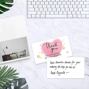 Pink watercolor heart thank you cards for small business on marble desk background