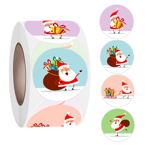 Dettaglio del rotolo di adesivi Buon Natale con quattro motivi di Babbo Natale a cartone