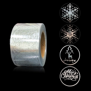 Holographic silver snowflake and Merry Christmas roll stickers for holiday gift packaging