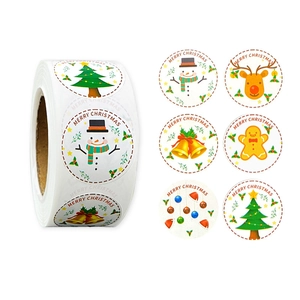Detail of Christmas round stickers featuring Santa and Reindeer on a white kraft roll