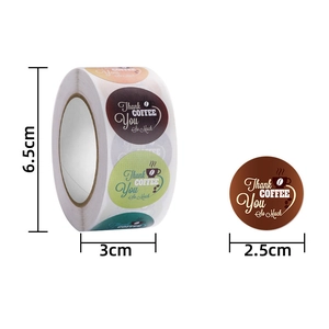 Detail of coffee packaging stickers with 2.5cm diameter measurement for rolls