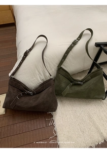Detail of vintage minimalist tote bags in dark coffee and olive green with adjustable straps