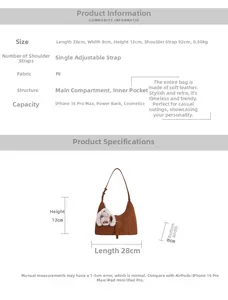 Detailed view of brown faux suede crescent bag with dimensions 28x8x13cm and rabbit charm