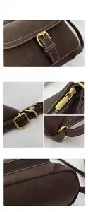 Detail view of dark brown faux leather bag with metal buckle and reinforced stitching