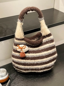 Handmade striped knit tote bag with mushroom charm and large capacity for daily use