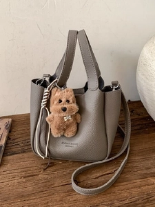 Women Retro Pebbled PU Leather Bucket Bag Minimalist Shoulder Handbag With Detachable Strap And Cute Plush Animal Pendant