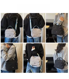 Detailed views of multi-layer crossbody bags in black and gray with logo straps
