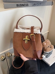 Brown faux suede bucket bag with white faux fur trim and cute bear charm for women