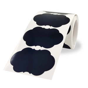 Waterproof black PVC chalkboard stickers with retro wavy edges on a white roll