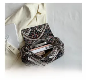 Internal view of a colorful geometric woven tote showing spacious capacity for daily items