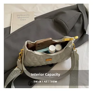 Internal view of light grey quilted crossbody bag showing spacious storage for daily items
