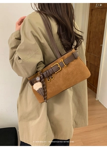 Brown retro baguette shoulder bag with metal buckle detail and cute ice cream charm