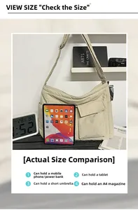 Detail view of beige canvas tote bag showing large capacity for iPad and A4 magazines