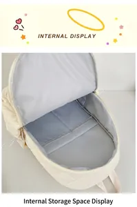 Internal view of cream quilted backpack with spacious main compartment and two slip pockets