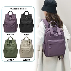 Detail view of water-resistant nylon backpack showing four colors and a model wearing it
