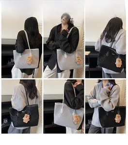 Detailed views of leopard print tote bag with plush bear charm in multiple indoor angles