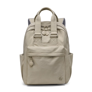 Detailed view of beige nylon travel backpack showing dual zippers and ms logo accent