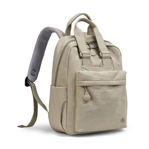 Macro view of light khaki nylon backpack features breathable grey mesh padded shoulder straps