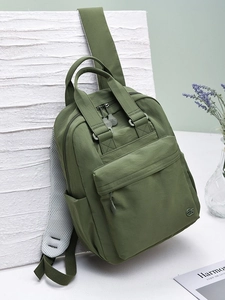 Deep green nylon backpack with large capacity and breathable straps for travel and school