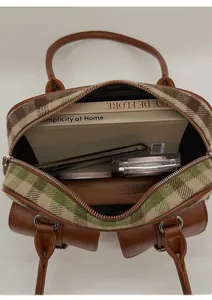 Top view of retro plaid wool tote showing spacious interior with books and phone
