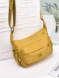 Water-resistant ginger yellow nylon crossbody bag with large capacity and multi-pockets