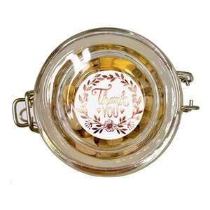 White glass jar sticker with rose gold Thank You text and elegant floral border