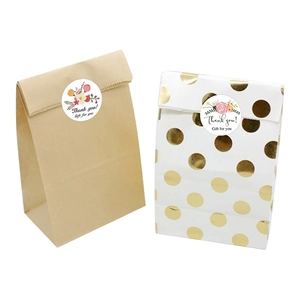 Kraft and gold polka dot gift bags with Thank You floral stickers for celebrations