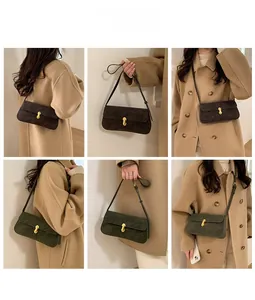 Detail view of retro rectangle underarm bag in dark brown and olive green colors