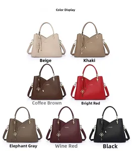 Collection of lychee texture bucket bags in seven colors with V-cut design and key pendant