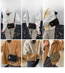Detail view of retro matte leather boston bag showing black, brown and green color options
